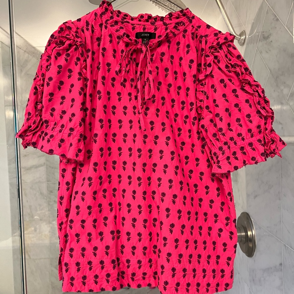 Embroidered J Crew shirt with tie at neck and ruffle on sleeve. Barely worn.